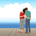 Enamored couple embrace and stand on the pier and look into the distance of the sea. Love Story Royalty Free Stock Photo