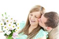 Enamored man giving a bouquet to his girlfriend Royalty Free Stock Photo