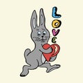 Enamored rabbit with heart and inscription love