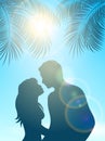 Enamored under palm and sun Royalty Free Stock Photo