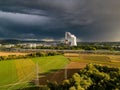 ENBW Energy Station in Heilbronn with a dark cloudy sky