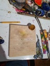 Encaustic painting, also known as hot wax painting, colored pigments, heated beeswax, untreated wood