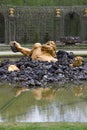 Enceladus Grove statue at Gardens of Versailles Royalty Free Stock Photo