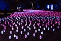 Enchanted forest - magical field of glowing glass tulips at night