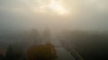 Aerial View: Misty Morning Over Forest Canal in Autumn Royalty Free Stock Photo