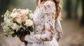 Enchanting bride grasps bouquet, adorned in her exquisite dress, captivating wedding details