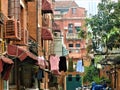 Enchanting corner of Shanghai city, China. Houses, hanging clothes and fascination Royalty Free Stock Photo