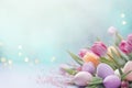 Enchanting Easter background with eggs, flowers and copy space for text. Soft, pastel colors. Tranquil and joyful scene
