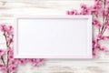 Enchanting Elegance: A Pink Flower Frame on a White Wooden Wall