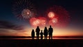 Enchanting fireworks illuminate night sky as crowd joyfully celebrates holiday outdoors