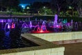 Enchanting grandiose musical performance - water and light show of a musical fountain on the embankment, in the center of the city