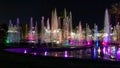 Enchanting grandiose musical performance - water and light show of a musical fountain on the embankment, in the center of the city