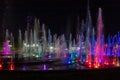 Enchanting grandiose musical performance - water and light show of a musical fountain on the embankment, in the center of the city