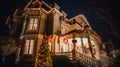 Enchanting Holiday Grandeur: Mesmerizing Nighttime Photo of Victorian Mansion\'s Decorated Entrance Royalty Free Stock Photo