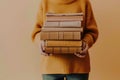 Educational Enchantment: Woman Holds Books, Evoking Education, Science, Knowledge, and the Magic of Learning Royalty Free Stock Photo