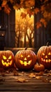 Enchanting Trio: Glowing Jack-o-Lanterns on Autumn Porch Royalty Free Stock Photo