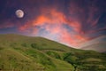 Enchanting Wallpaper, Captivating Moonrise Behind a Serene Pine Forest at Sunset.