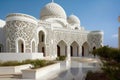 Enchanting White Mosque with Intricate Domes, Lattice Work, and Detailed Engravings, Exuding Tranquility and Awe-inspiring Beauty