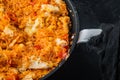 Enchilada with tomato rice, a mexican recipe, on black background Royalty Free Stock Photo