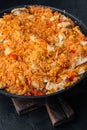 Enchilada with tomato rice, a mexican recipe, on black background