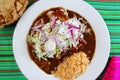 Enchiladas de mole and rice Mexican food