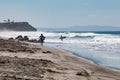 Two Male Surfers on Beacon`s Beach in Encinitas, California Royalty Free Stock Photo