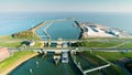 Enclosure Dam (Afsluitdijk): Large Cargo Ship Going Under the Bridge - Friesland, The Netherlands â 4K Drone