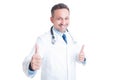 Encouraging and heartening medic or doctor showing double like Royalty Free Stock Photo