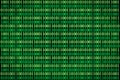 Encrypted binary ASCII computer code on black background. Green binary code computer Royalty Free Stock Photo