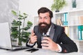 Encrypted communication app will protect your company secrets. Bearded man use wireless communication in office Royalty Free Stock Photo