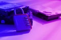Encrypted hard disk. Padlock with cipher on an opened hard disk. Data loss. computer motherboard. the concept of data