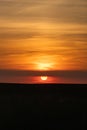 The end of the day just before the sunsets on the horizon with an amazing orange glow in riemst near Maastricht Royalty Free Stock Photo