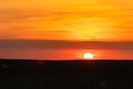 The end of the day just before the sunsets on the horizon with an amazing orange glow in riemst near Maastricht Royalty Free Stock Photo