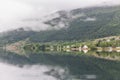 End of fjord. Beautiful Norwegian landscape. view of the fjords. Norway ideal fjord reflection in clear water In cloudy weather. Royalty Free Stock Photo