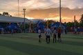 End of football tournament, players standing on the sward.