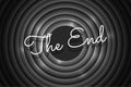 The End handwrite title on black and white round background. Old cinema movie circle ending screen. Vector noir Royalty Free Stock Photo