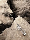 The end knot of steel rope. Climbers path via ferrata. Steel bolt anchor eye Royalty Free Stock Photo