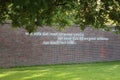 end line of a poem by journalist, publisher and resistance member Henk van Randwijk on the wall of the park in Amsterdam named