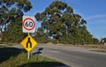 The end of a major road in suburban Melbourne with dual lanes signage going to one