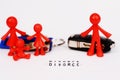 End of marriage concept with family miniature and goods division after divorce Royalty Free Stock Photo