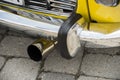 End of the mufflers of a vintage car