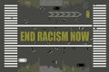 END RACISM NOW printed in large letters, painted by community on different streets of the USA, top view. BLM, Black lives matter