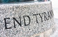 End Tyranny in Granite Royalty Free Stock Photo