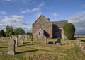 An end on View of Stracathro Parish Church situated in a Valley of arable farmland.