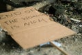 End of the world apocalyptic sign in pile of rubble Royalty Free Stock Photo