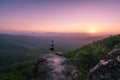 A guy standing on reeds lookout in the Grampians national park, Australia