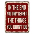 In the end you only regret the things you didn`t do vintage rusty metal sign Royalty Free Stock Photo