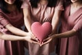 Cropped image of three women holding heart shaped pillow in their hands Ai generative Royalty Free Stock Photo