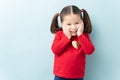 Endearing little girl in a studio