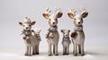 an endearing scene with three charming reindeer figurines, each wearing festive accessories
